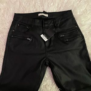 Purchased in Aviano Italy. Leather like black pants